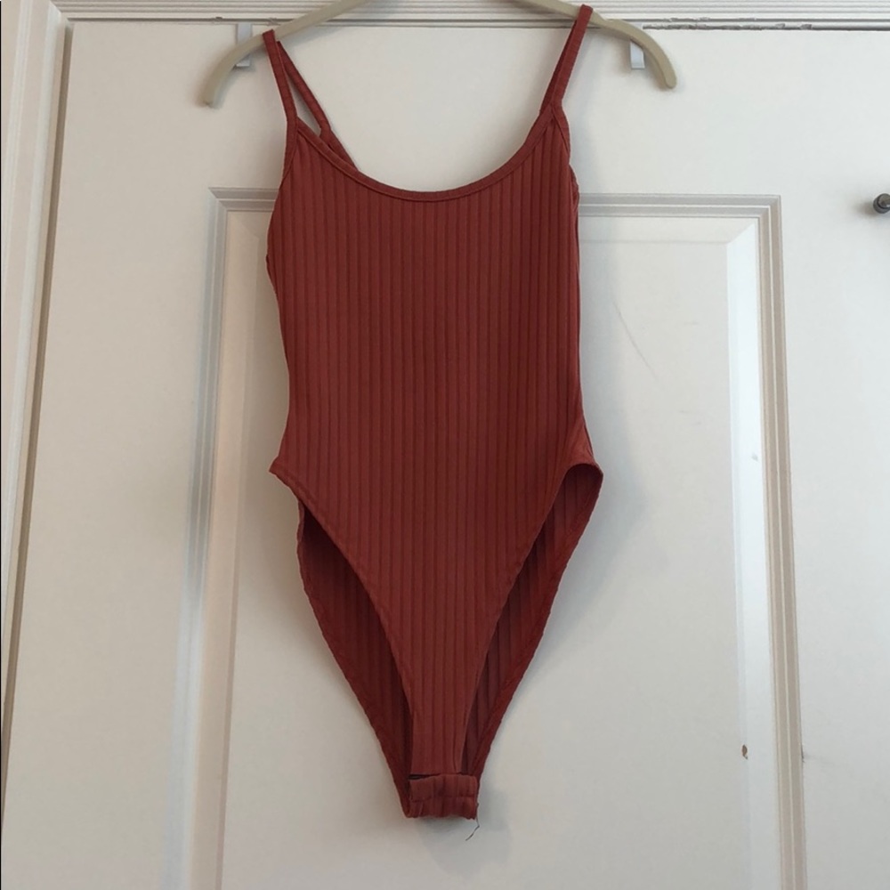 Rust orange ribbed bodysuit